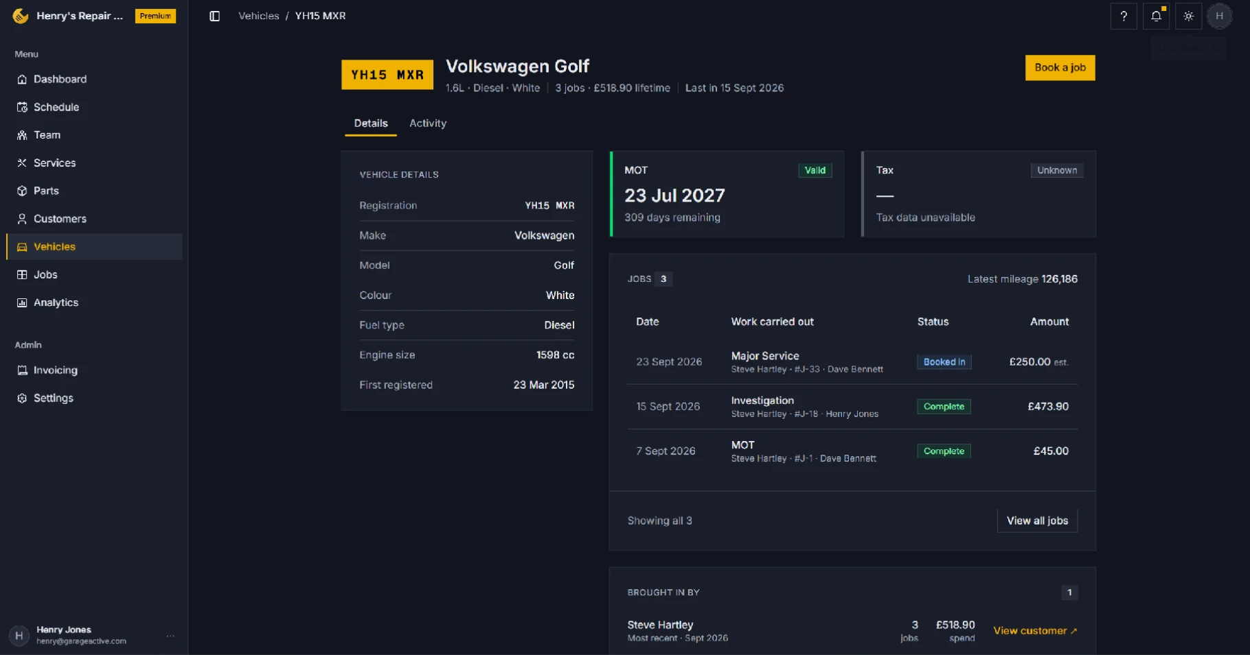 GarageActive vehicle page showing details, MOT status and job history for a number plate