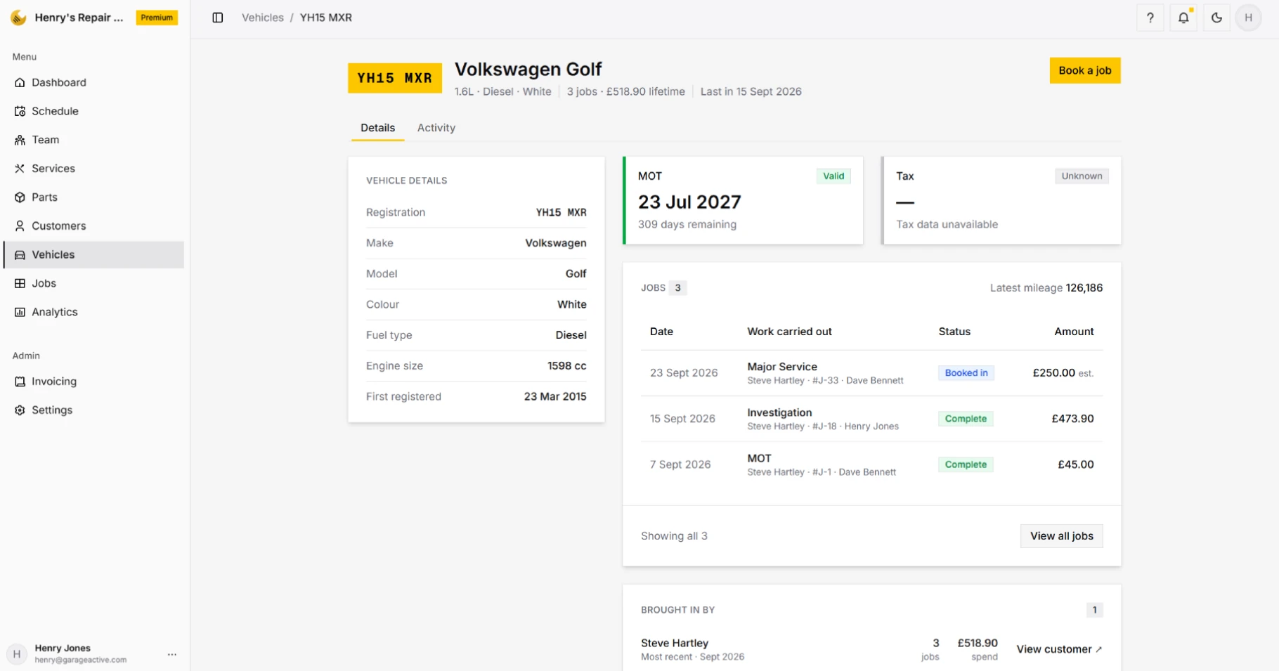 GarageActive vehicle page showing details, MOT status and job history for a number plate